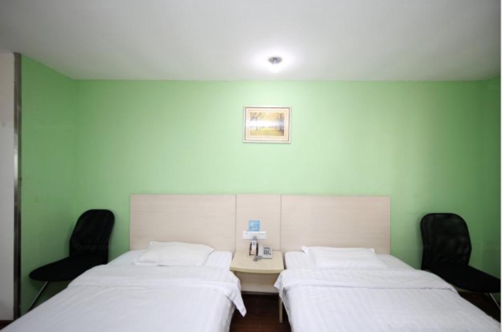 Yixin Business Hotel Canton Extérieur photo