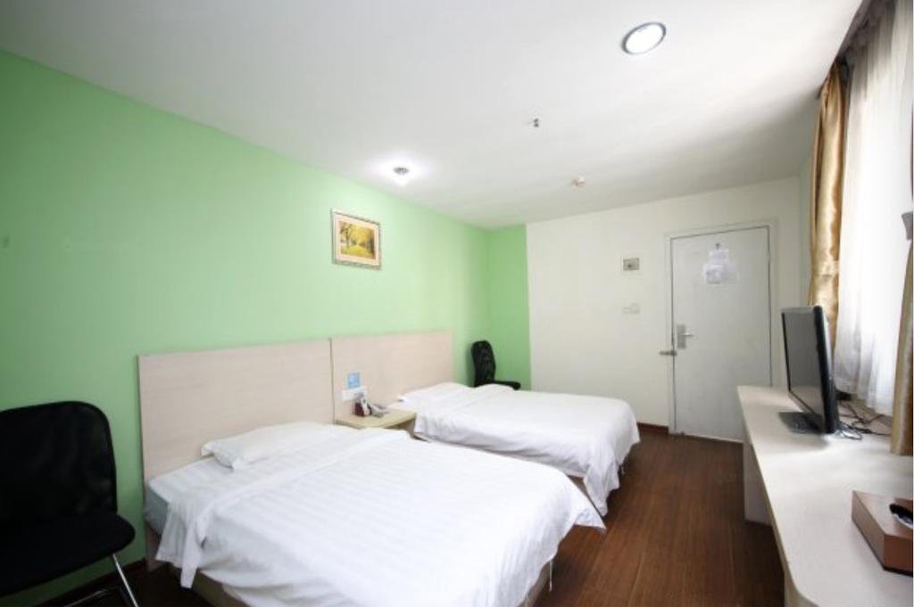 Yixin Business Hotel Canton Extérieur photo