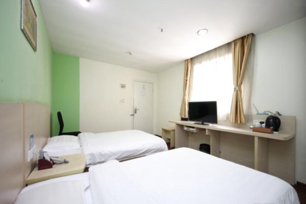 Yixin Business Hotel Canton Extérieur photo