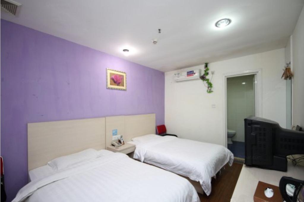 Yixin Business Hotel Canton Extérieur photo