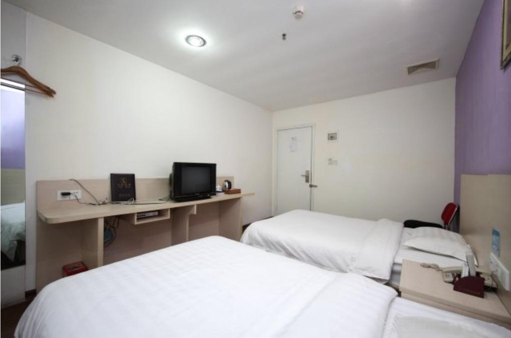 Yixin Business Hotel Canton Extérieur photo
