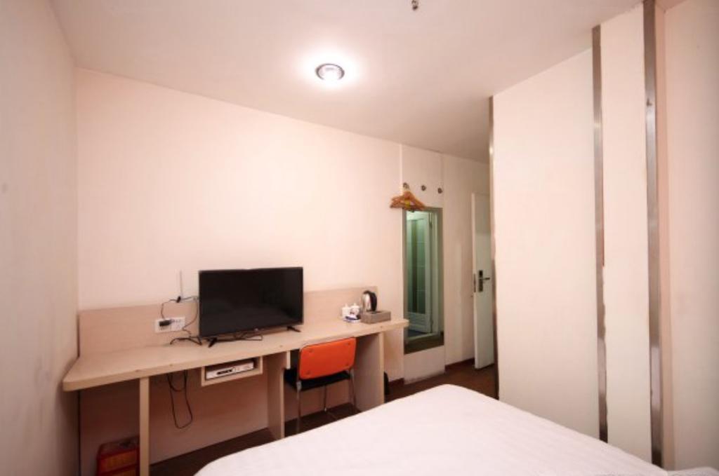 Yixin Business Hotel Canton Extérieur photo