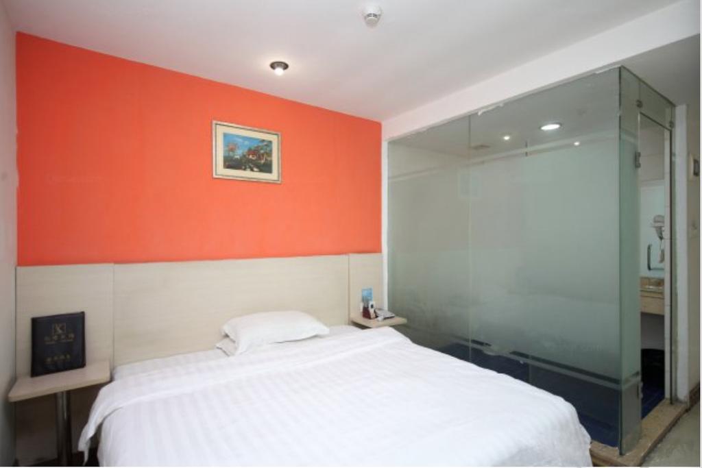 Yixin Business Hotel Canton Extérieur photo