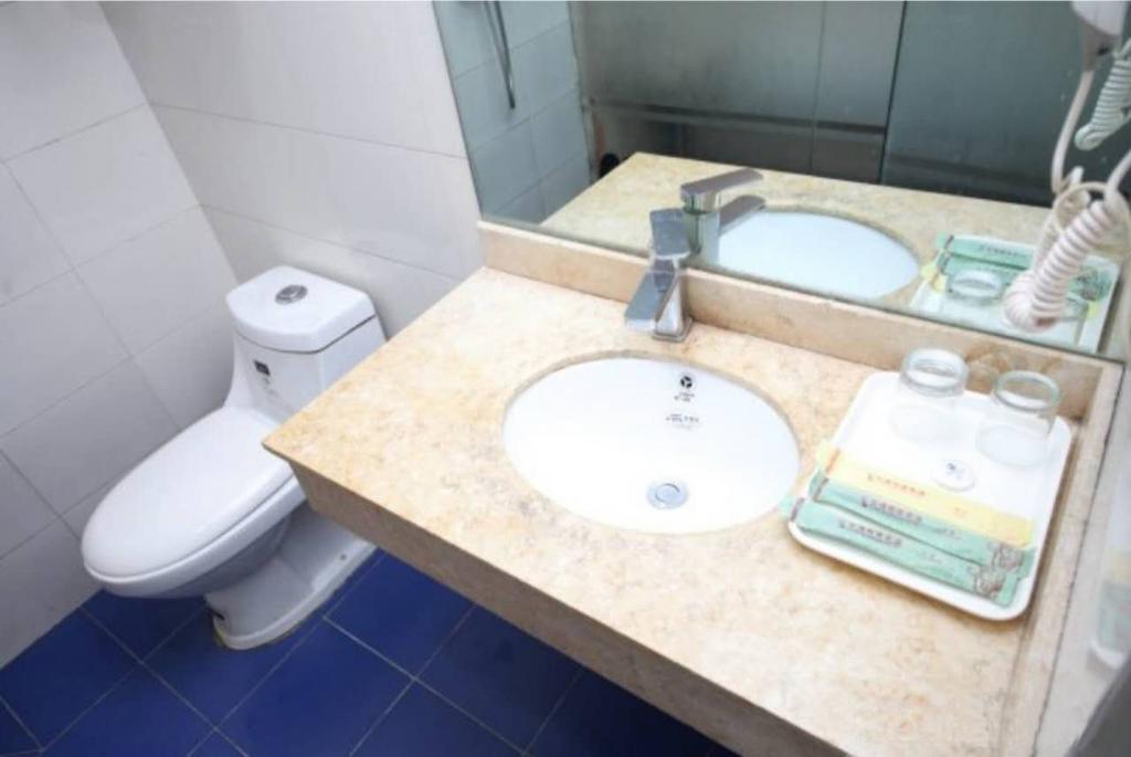 Yixin Business Hotel Canton Extérieur photo