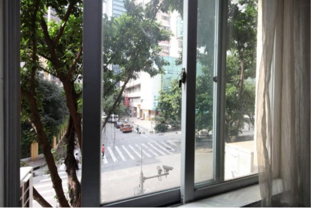 Yixin Business Hotel Canton Extérieur photo