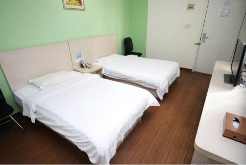 Yixin Business Hotel Canton Extérieur photo