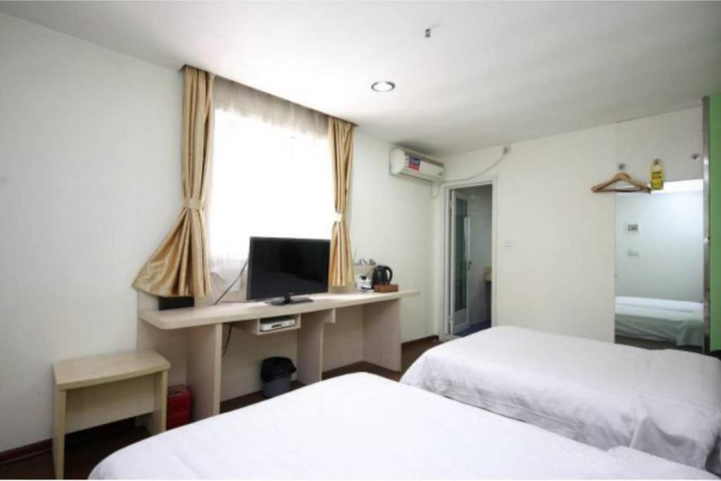 Yixin Business Hotel Canton Extérieur photo