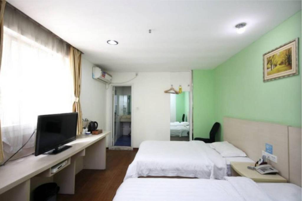 Yixin Business Hotel Canton Extérieur photo