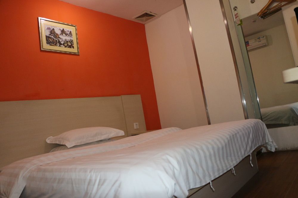 Yixin Business Hotel Canton Extérieur photo