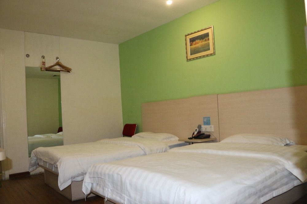 Yixin Business Hotel Canton Extérieur photo
