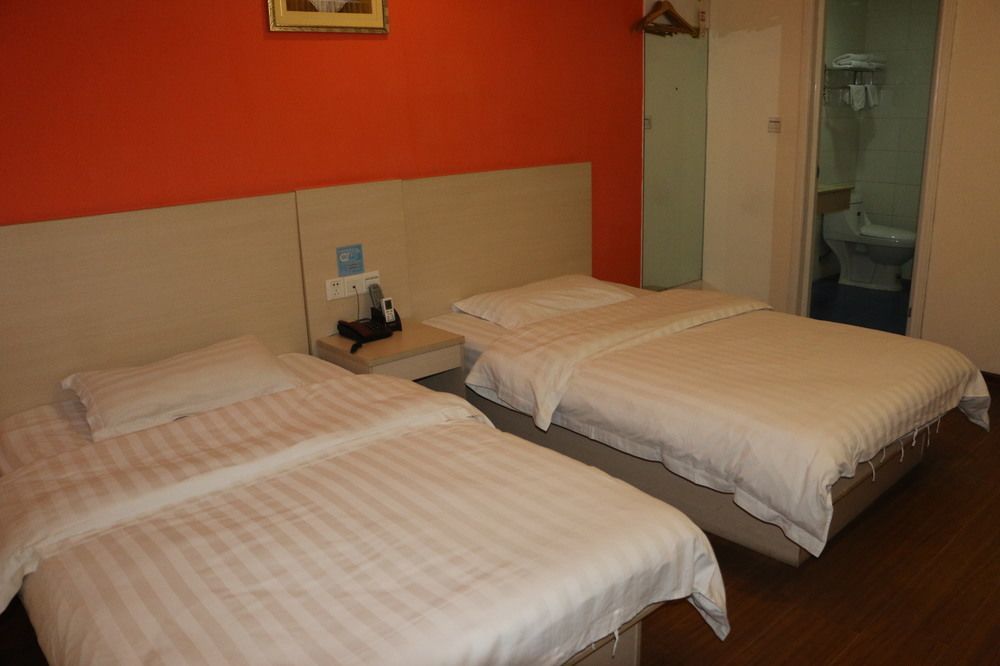 Yixin Business Hotel Canton Extérieur photo