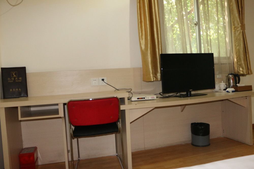Yixin Business Hotel Canton Extérieur photo