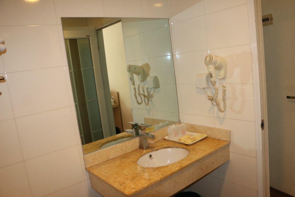 Yixin Business Hotel Canton Extérieur photo